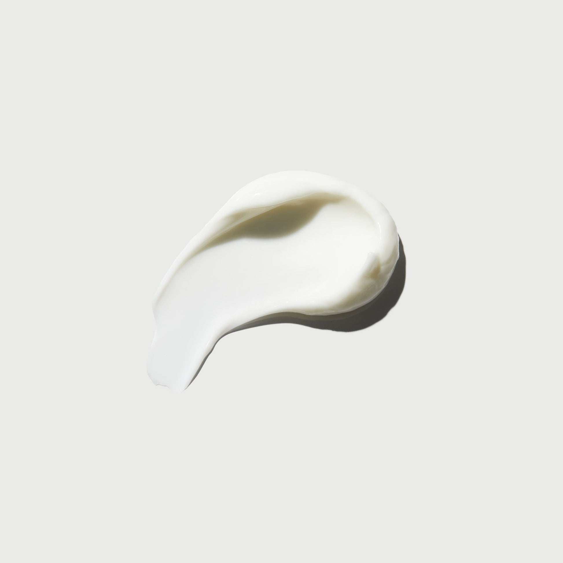 the-smoother-glycolic-acid-body-lotion-f5 NATR-40014-Swatch-The-Smoother-Glycolic-Acid-Body-Lotion-bonebkgd.jpg